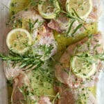 This Rosemary Lemon Chicken is simple and easy—no chopping required! Just toss in some fresh herbs and lemon slices and roast for a perfect weeknight dinner. 