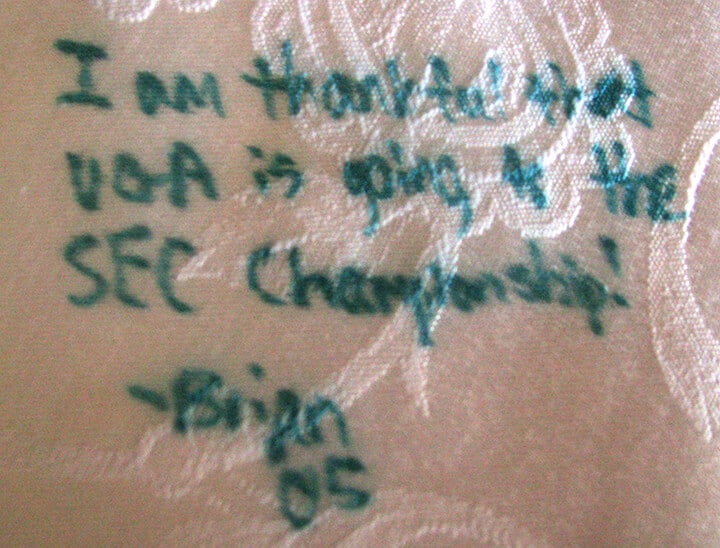 A quote on the Thanksgiving tablecloth, part of our Thanksgiving tablescape.