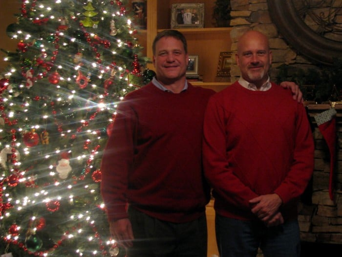 Husbands in unplanned matching sweaters.