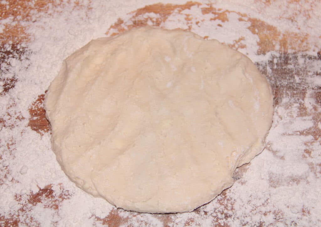 pie crust dough on a floured surface