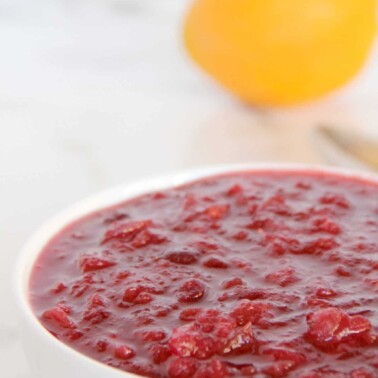 Cranberry sauce recipe using fresh cranberries, orange zest, pineapple, and a little horseradish.