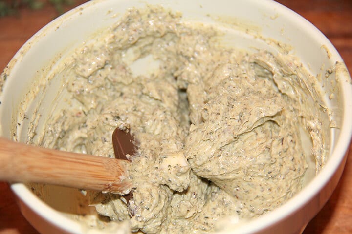 A bowl of mixed herb butter for turkey.