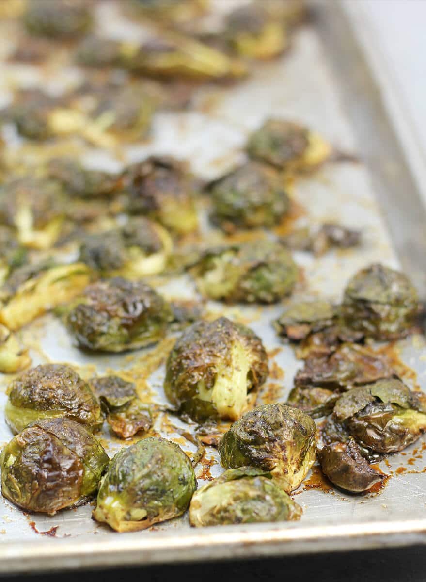 Roasted Brussels Sprouts closeup on a baking sheet. 