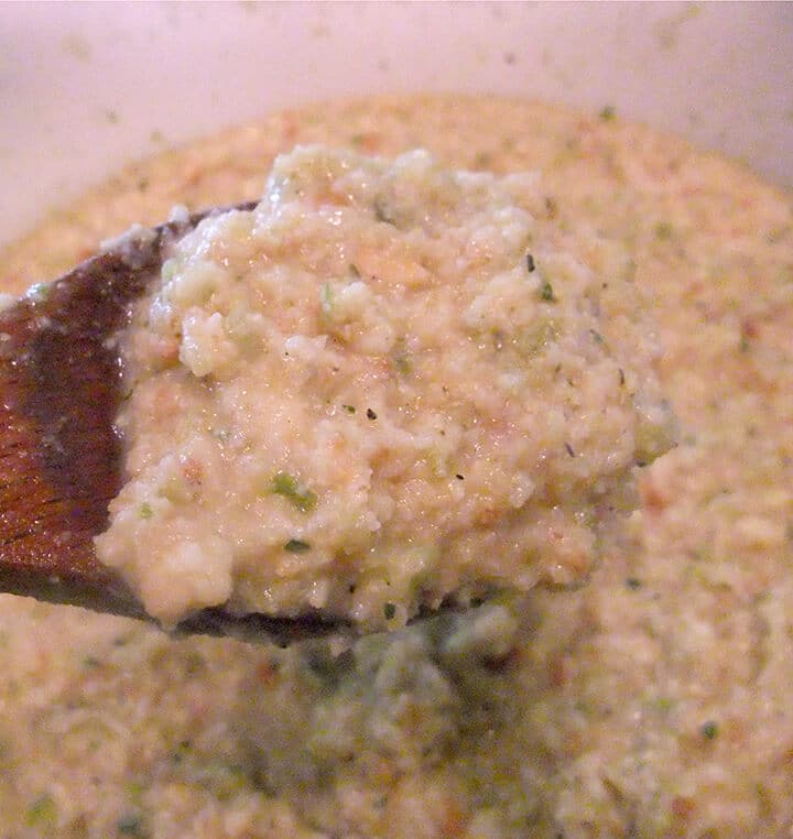 A spoonful of unbaked cornbread dressing.