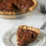 This Southern Pecan Pie recipe is a classic but swaps old-fashioned cane syrup for some of the corn syrup. The result is intense and delicious flavor, not just overwhelming sweetness!