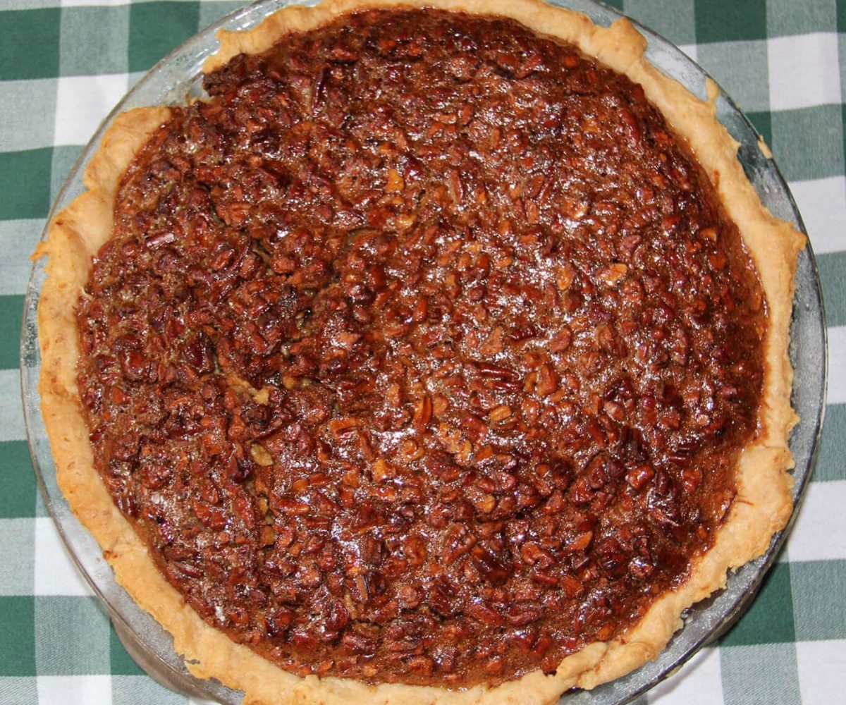 This Southern Pecan Pie recipe is a classic but swaps old-fashioned cane syrup for some of the corn syrup.