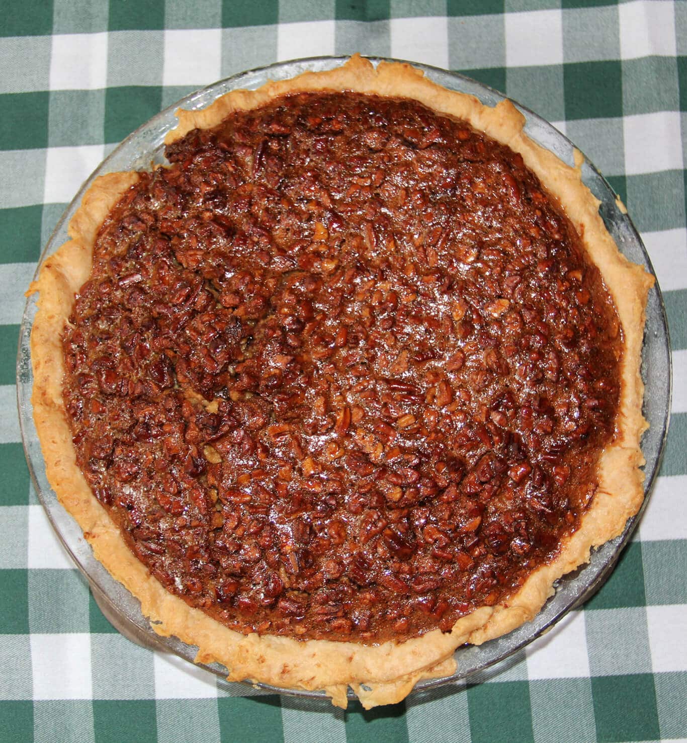 This Southern Pecan Pie recipe is a classic but swaps old-fashioned cane syrup for some of the corn syrup.