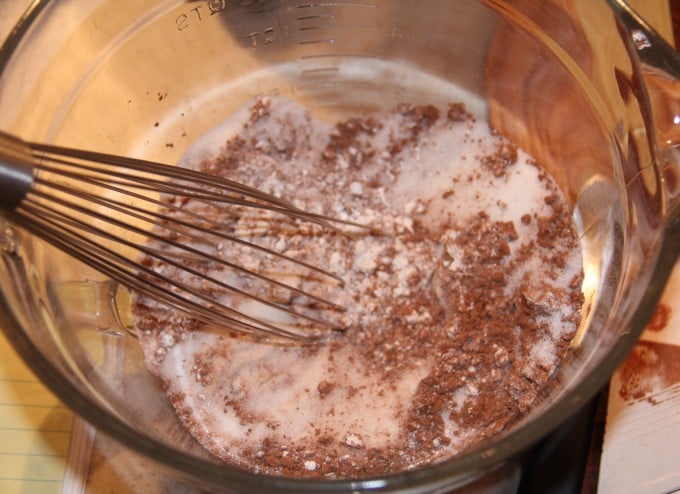 Mixing ingredients for chocolate cobbler.