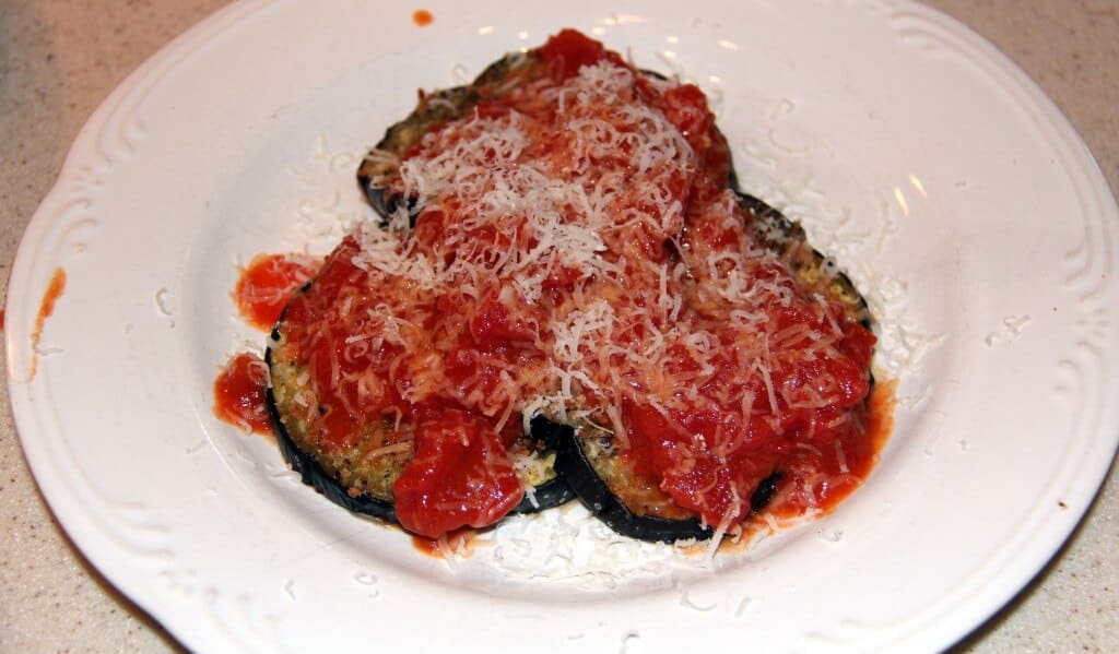 tomato sauce over eggplant