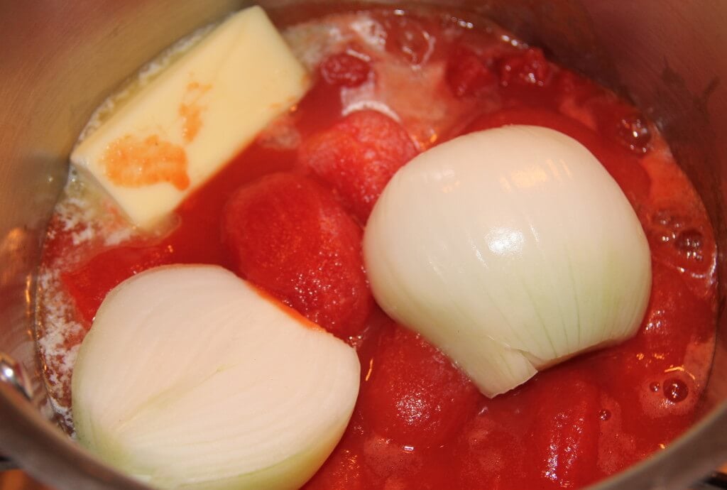 cooking tomatoes, butter, and onion