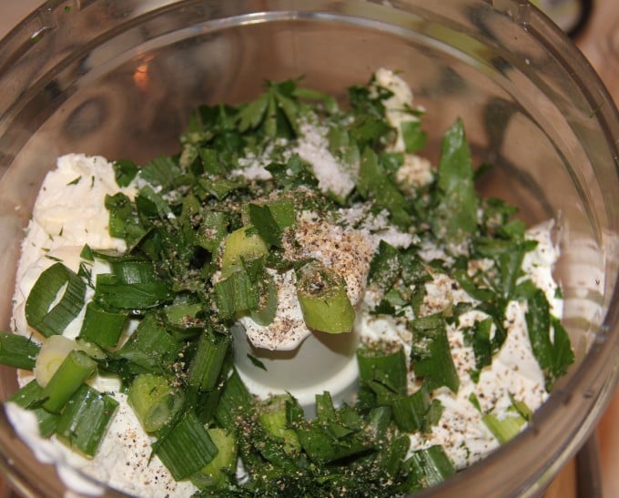 making herb dip in food processor