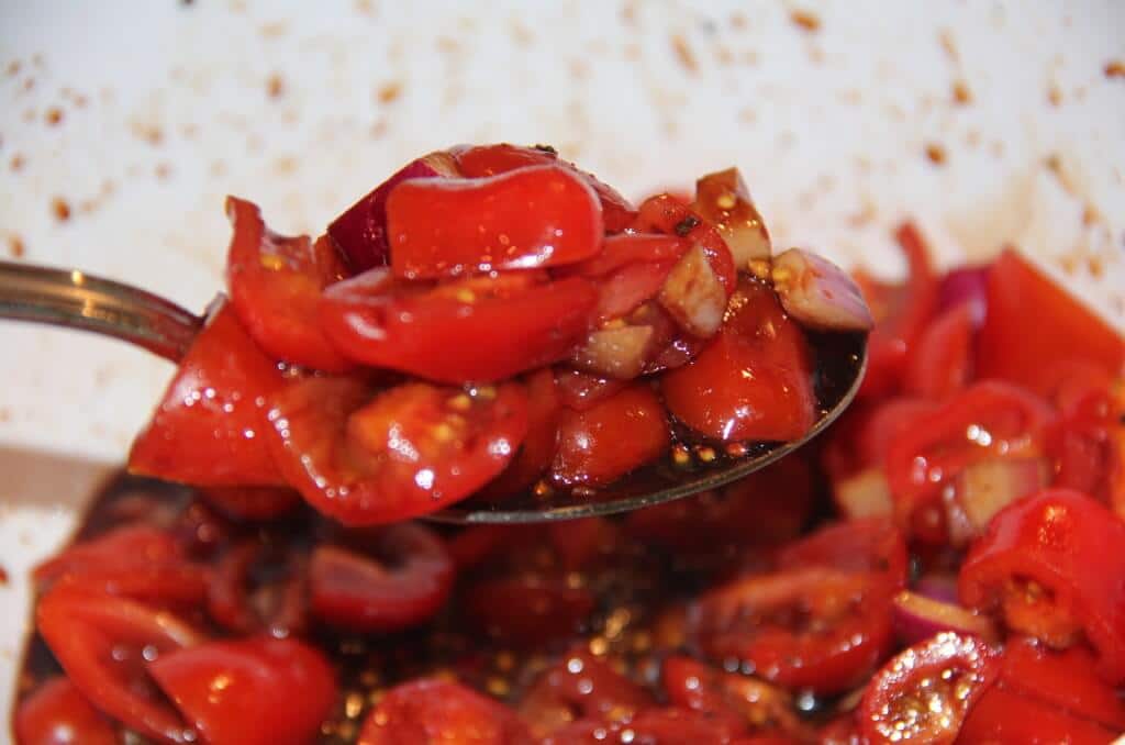 Tomato Salad Recipe--grape tomatoes, onion, balsamic reduction in a simple, easy tomato salad that makes a great side dish!