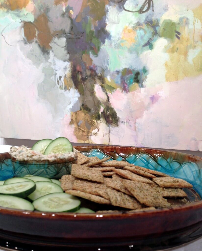 smoked salmon dip in front of painting