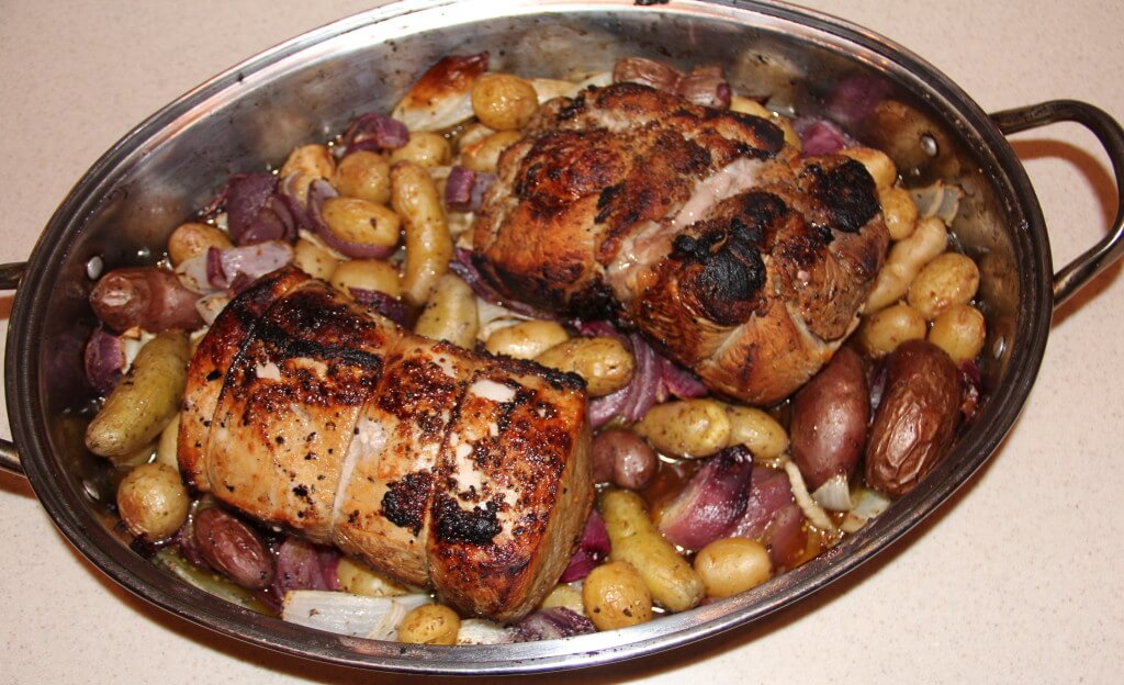 A one-pot meal of pork roast, potatoes, onions, and fennel.