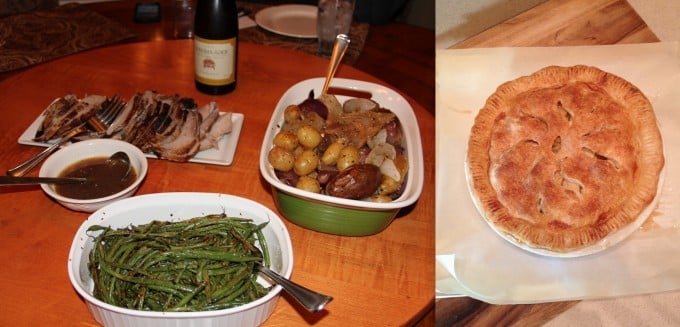 roast pork and apple pie and green beans on table