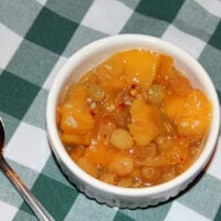 Peach Chutney with fresh ginger and lime juice is the perfect topping for your grilled meats or your holiday ham! And it's a great make-ahead condiment!