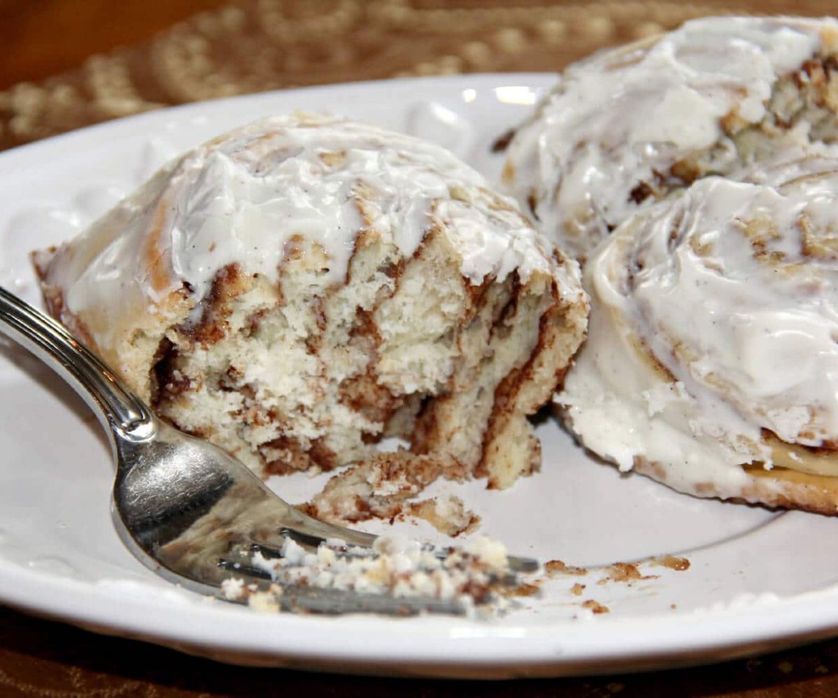 Easy homemade cinnamon rolls filled with brown sugar and cinnamon and covered with cream cheese icing!
