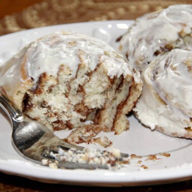 Easy homemade cinnamon rolls filled with brown sugar and cinnamon and covered with cream cheese icing!