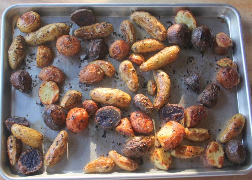 Roasted baby potatoes with garlic and Italian herbs are crispy on the outside and soft and fluffy on the inside. Easy to make!