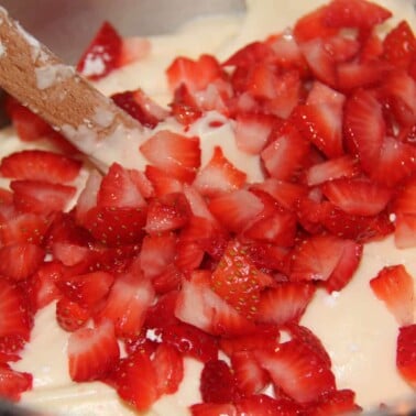 Fresh strawberry cake filled with strawberry-lemon jam and topped with a fresh strawberry cream cheese frosting—this is a special occasion show-stopper and it's divine!