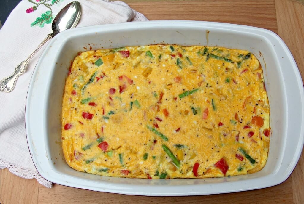 Overhead view of Frittata with vegetables and cheese.