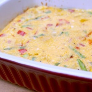 A red dish of a frittata.