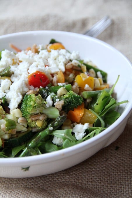 Serve vegetable salad over arugula with goat cheese | inasouthernkitchen.com