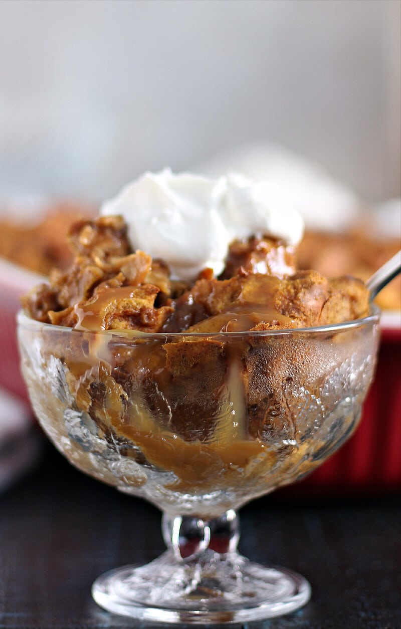 Side view of a serving of pumpkin bread pudding. 