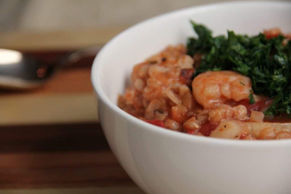 bowl of shrimp, farro, and tomato risotto
