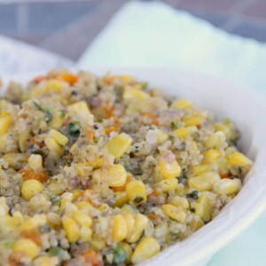 A bowl of quinoa salad with corn.