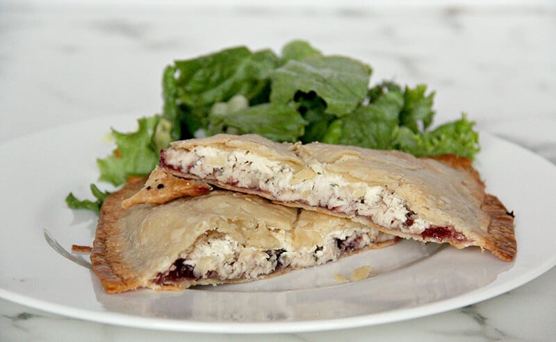 Side view of the inside of the baked leftover turkey hand pies.