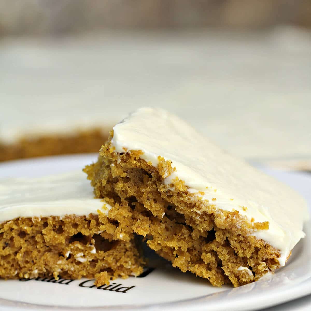 Tender, spicy Pumpkin Sheet Cake topped with a to-die-for white chocolate cream cheese frosting