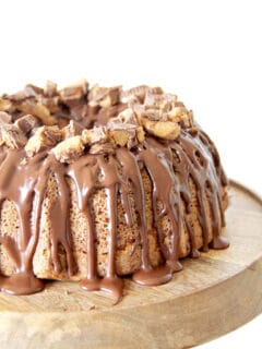Peanut Butter Pound Cake topped with chocolate glaze and covered in Reese's Peanut Butter Cups.