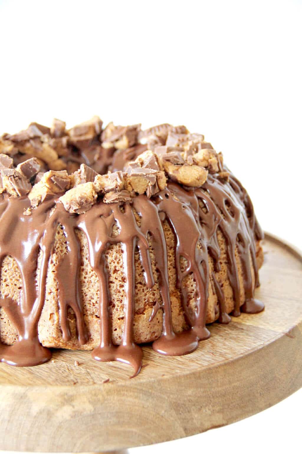Peanut Butter Pound Cake topped with chocolate glaze and covered in Reese's Peanut Butter Cups.