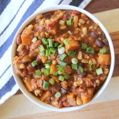 Slow Cooker Vegetarian Chili with Sweet Potatoes--hearty, filling, and full of flavor from beans, tomatoes, and sweet potatoes!