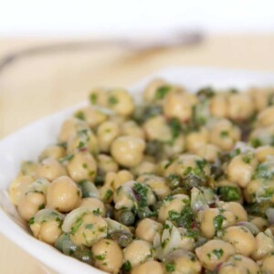 a white bowl of chickpea salad.