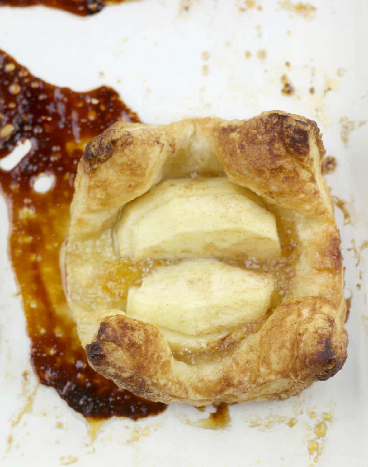 Apple tarts with orange-almond marmalade using puff pastry--quick and easy! Perfect for a weeknight dessert or even for company.