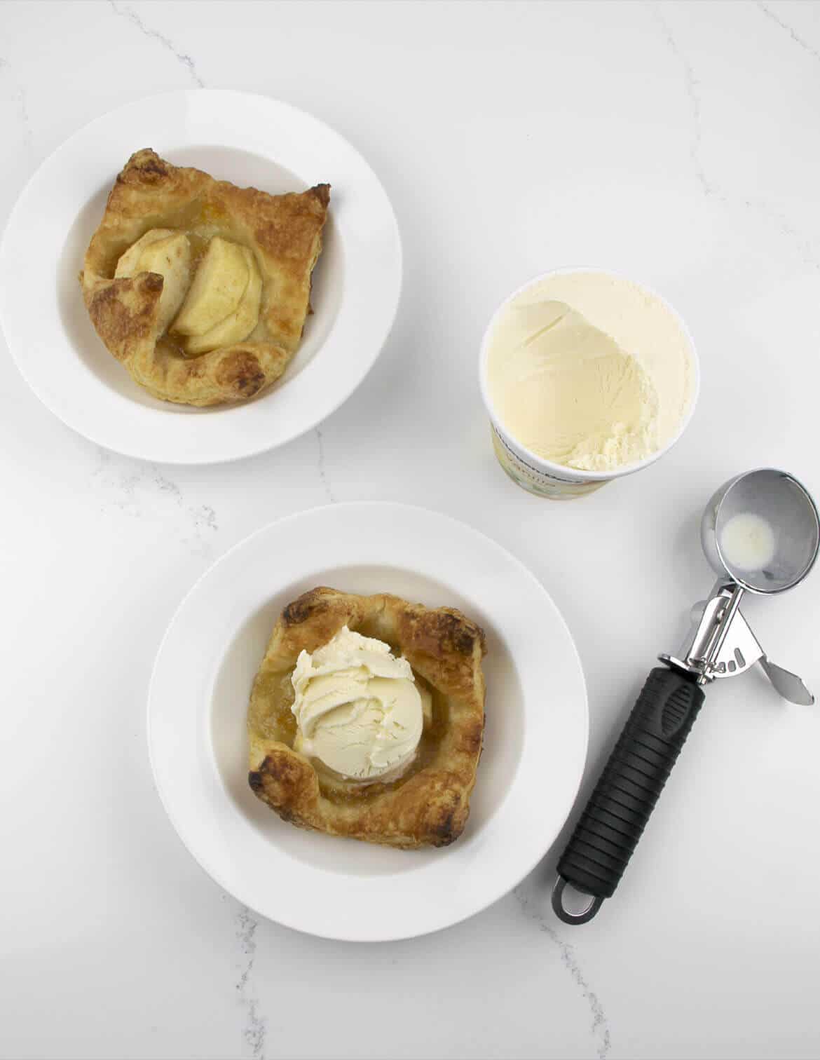 Apple tarts with orange-almond marmalade using puff pastry--quick and easy! Perfect for a weeknight dessert or even for company.