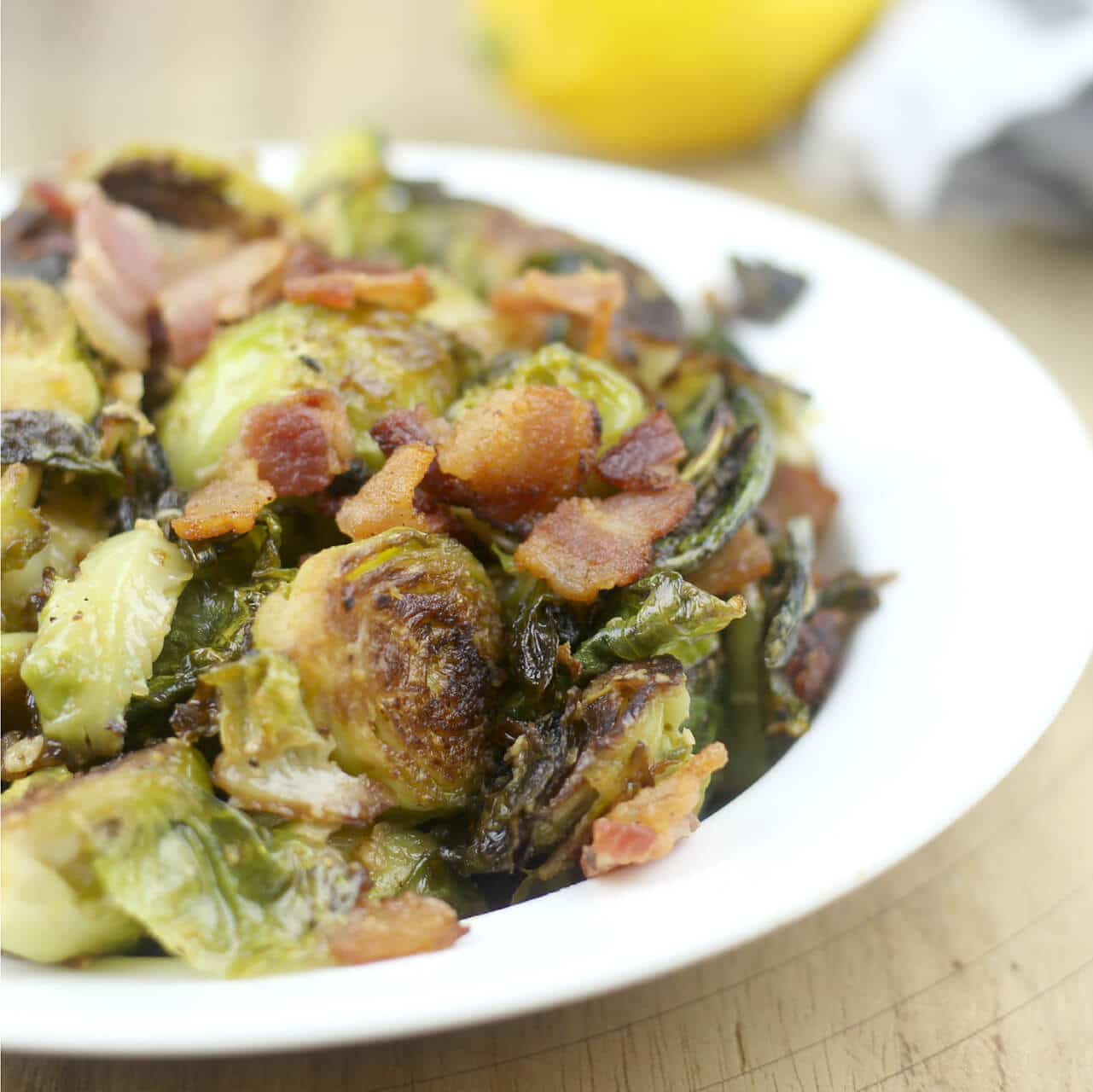 Brussels sprouts sauteed and topped with a lemon and Dijon vinaigrette, then sprinkled with Parmesan cheese and bacon—a new twist on a favorite vegetable!