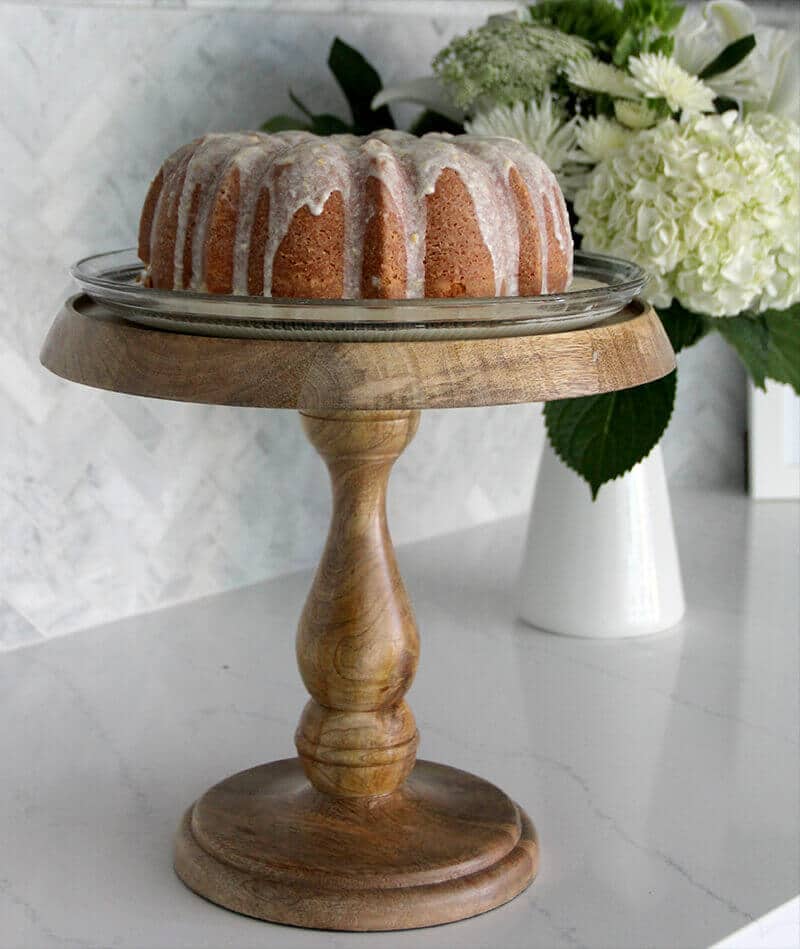 Easy Lemon Pound Cake with Lemon Glaze is a simple recipe using the Cream Cheese Pound Cake base and adding a zesty lemony glaze—it's fresh, pretty, and lip-smacking good!