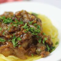These amazing pork chops with caramelized onions, capers, and white wine are delicious with noodles, mashed potatoes, cheese grits, or spaghetti squash.