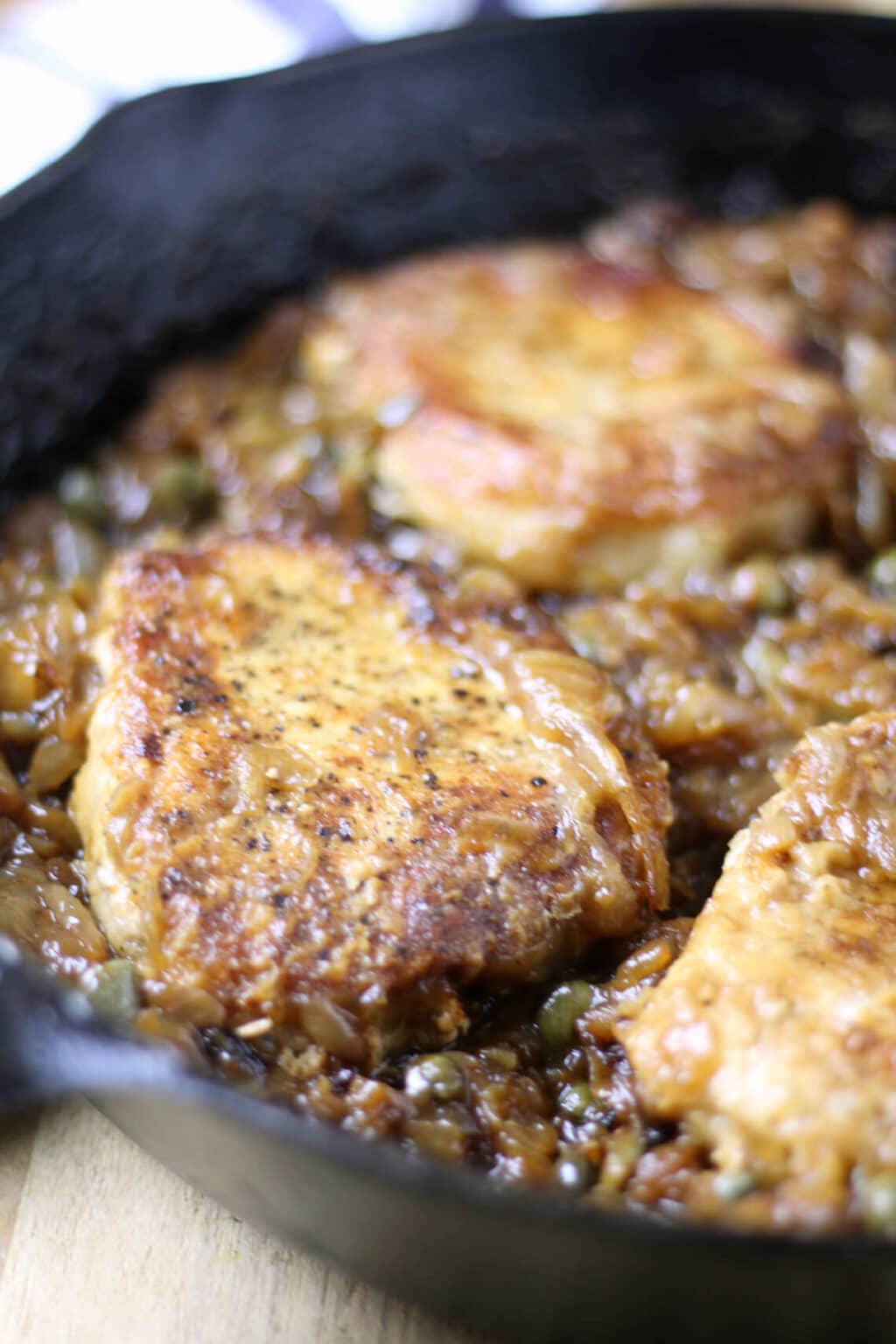 Pork Chops with Caramelized Onions, Capers, and White Wine