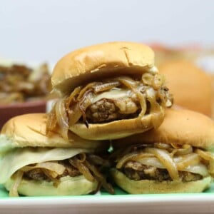 Country Fried Steak Sliders with Caramelized Onions will elevate your next tailgate to the knockout level! Wow your guests with these easy, tasty sliders!