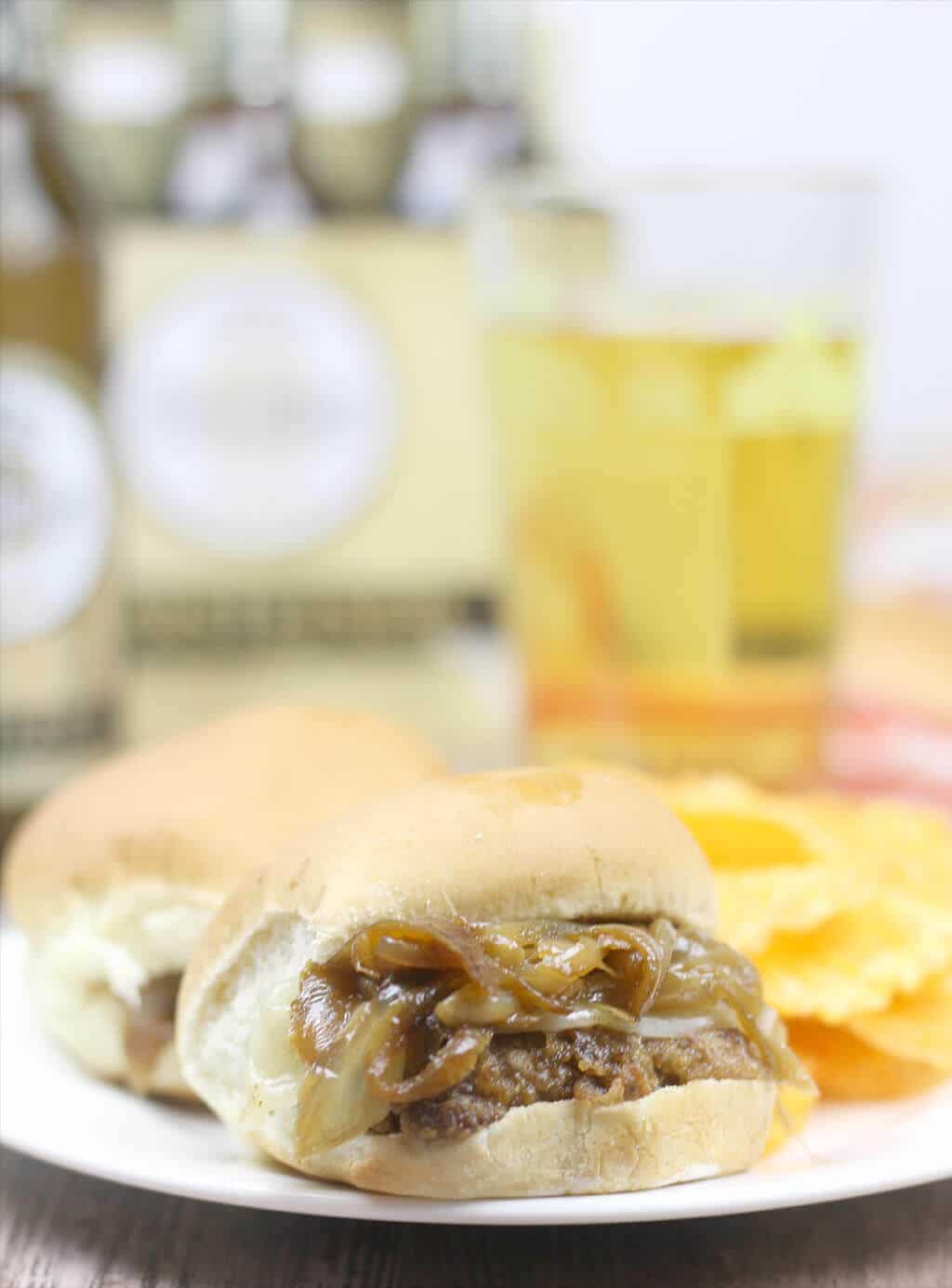Country Fried Steak Sliders with Caramelized Onions will elevate your next tailgate to the knockout level! Wow your guests with these easy, tasty sliders!
