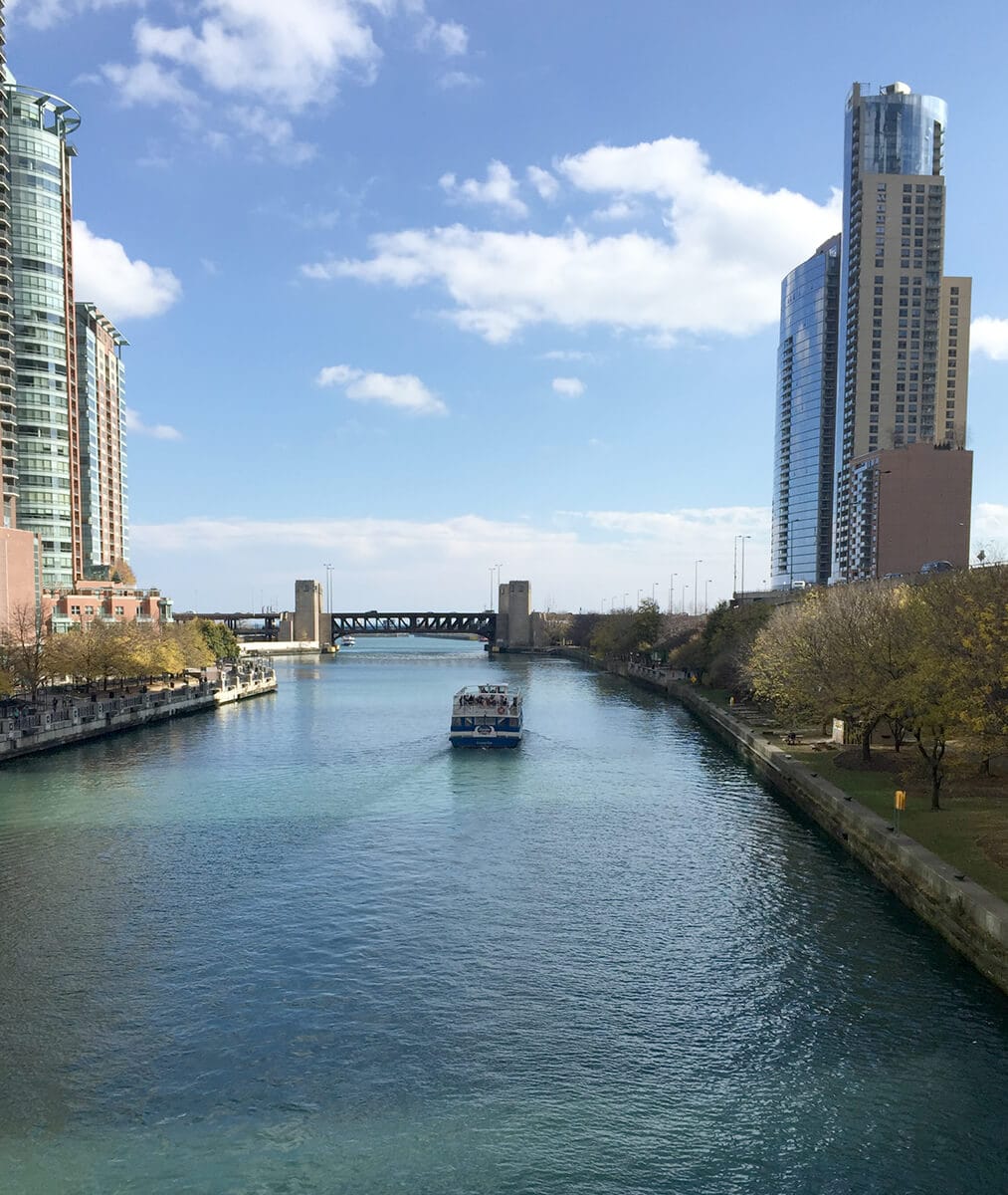 view of the chicago river with a boat