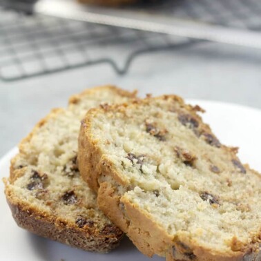 Slices of chocolate chip banana bread on a plate.