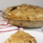 This easy double-crust apple pie recipe will become a classic for your recipe box. The filling is luscious with a hint of cinnamon and lots of apples!