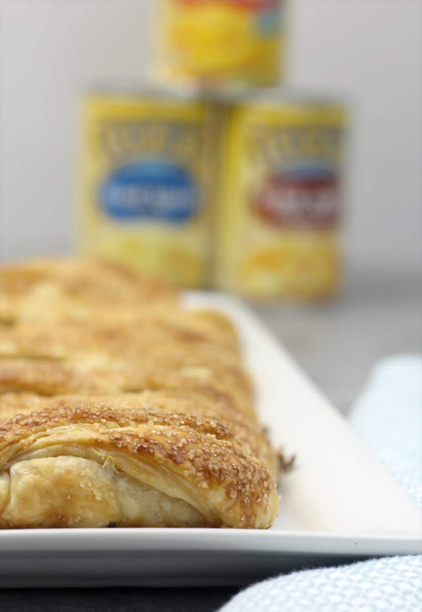 Corner piece of Easy Apple Strudel on a platter. 