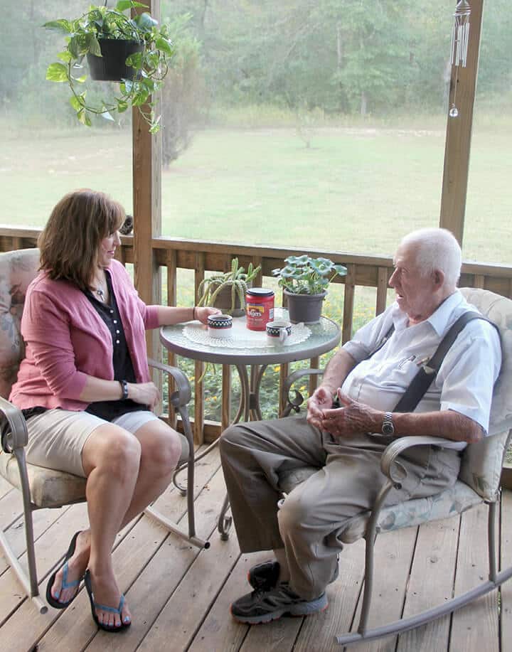 Talking to my dad on the porch.