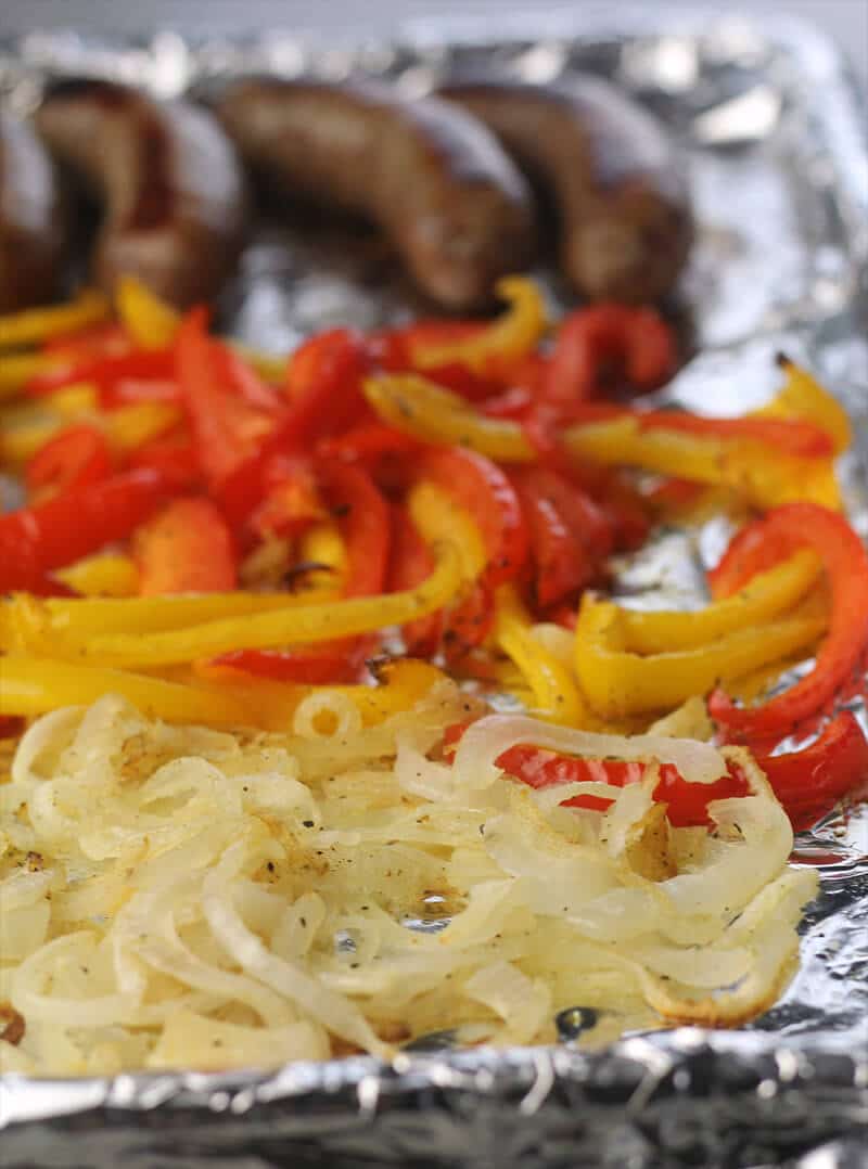 Sausage, Peppers, and Onions roasted on a sheet pan.